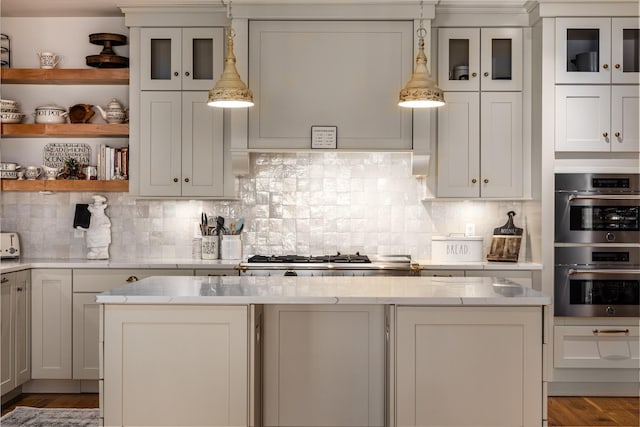 3585 Rte 82, Millbrook, NY 12545 - kitchen with appliances with stainless steel finishes, light wood-style floors, decorative backsplash, open shelves, and glass insert cabinets