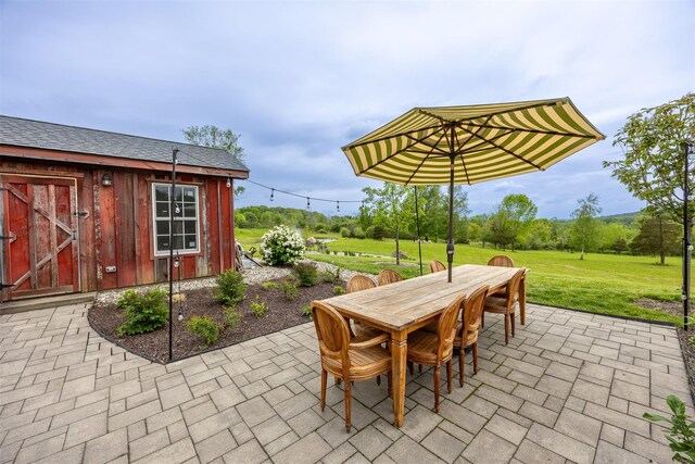 3585 Rte 82, Millbrook, NY 12545 - view of patio with outdoor dining space and an outdoor structure