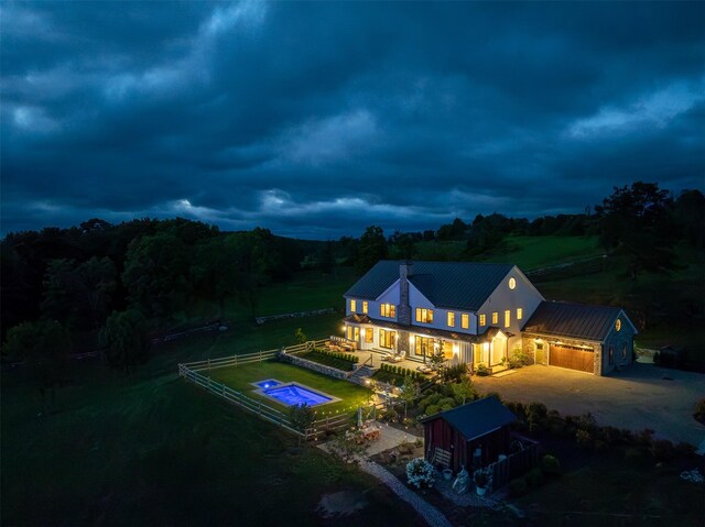 3585 Rte 82, Millbrook, NY 12545 - back of house featuring concrete driveway, a garage, and metal roof