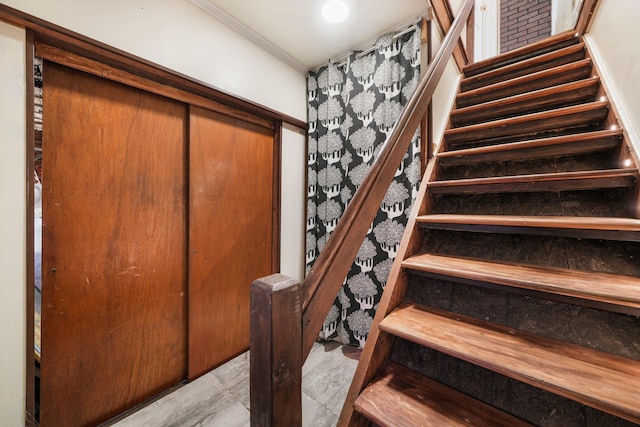 stairs featuring ornamental molding
