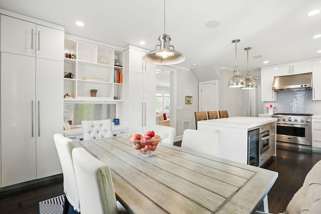 dining room featuring recessed lighting and dark wood-style floors