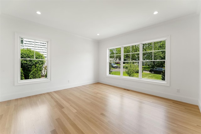 20 Carthage Ln, Scarsdale, NY 10583 - unfurnished room featuring ornamental molding, baseboards, light wood-style flooring, and recessed lighting