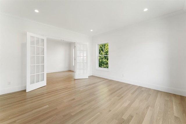 20 Carthage Ln, Scarsdale, NY 10583 - empty room featuring ornamental molding, baseboards, light wood-type flooring, recessed lighting, and french doors
