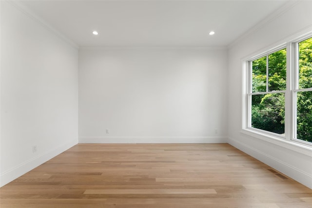 20 Carthage Ln, Scarsdale, NY 10583 - spare room featuring crown molding, baseboards, light wood finished floors, and recessed lighting