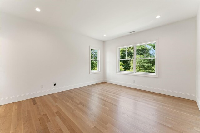 20 Carthage Ln, Scarsdale, NY 10583 - spare room with light wood finished floors, baseboards, and recessed lighting