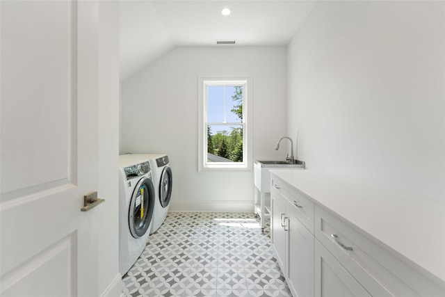20 Carthage Ln, Scarsdale, NY 10583 - laundry room with washing machine and dryer, cabinet space, and baseboards