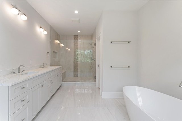 20 Carthage Ln, Scarsdale, NY 10583 - bathroom with a soaking tub, a shower stall, baseboards, double vanity, and recessed lighting