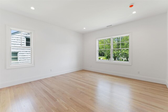 20 Carthage Ln, Scarsdale, NY 10583 - unfurnished room featuring light wood-type flooring, baseboards, and recessed lighting