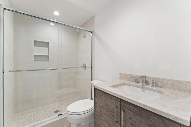 20 Carthage Ln, Scarsdale, NY 10583 - full bathroom featuring toilet, vanity, a shower stall, and recessed lighting