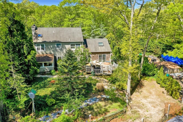 view from above of property featuring a forest