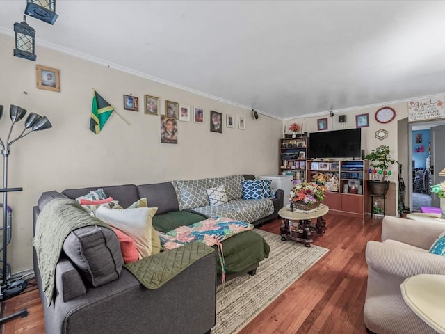 living room featuring ornamental molding and hardwood / wood-style flooring