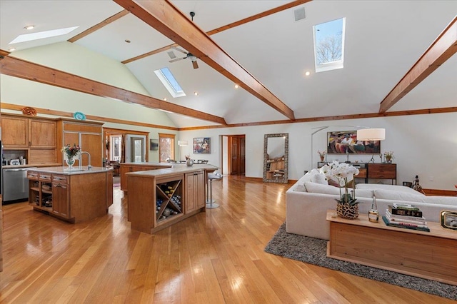 58 Big Island Rd, Warwick, NY 10990 - living area featuring a skylight, beamed ceiling, light wood-type flooring, and high vaulted ceiling