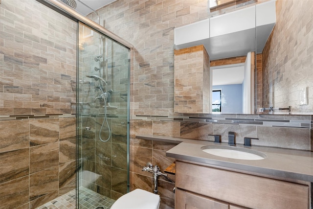 325 King St Unit 4D, Port Chester, NY 10573 - full bath with tile walls, vanity, a shower stall, and decorative backsplash