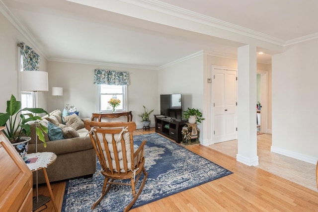 32 Peony Rd, Levittown, NY 11756 - living area with wood finished floors, crown molding, and baseboards