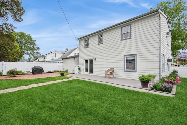 32 Peony Rd, Levittown, NY 11756 - back of house with a patio