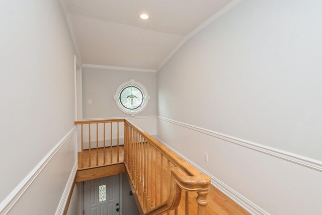 32 Peony Rd, Levittown, NY 11756 - staircase with ornamental molding, wood finished floors, and recessed lighting