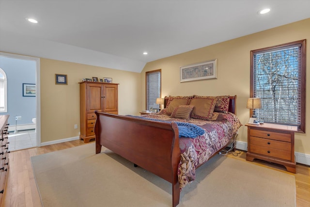 bedroom featuring light wood-type flooring, recessed lighting, and baseboards