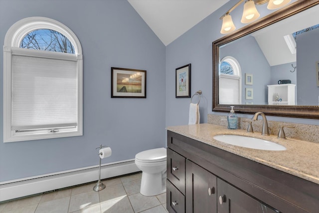 bathroom featuring baseboard heating, tile patterned floors, vanity, toilet, and lofted ceiling