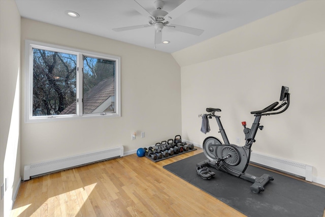 workout room with ceiling fan, baseboard heating, recessed lighting, and wood finished floors
