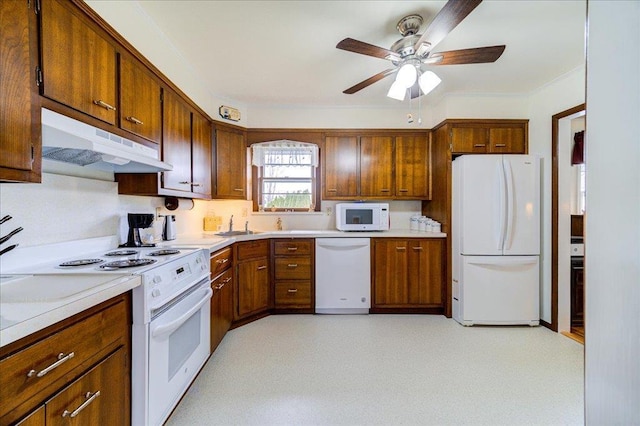 kitchen with white appliances, a ceiling fan, brown cabinets, and under cabinet range hood