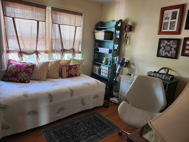 2575 Oaklawn Ave, Southold, NY 11971 - bedroom with wood finished floors and ornamental molding