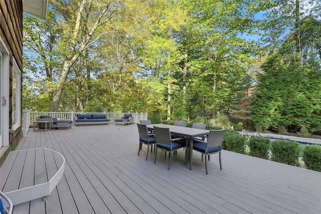 20 Rolling Ridge Rd, New City, NY 10956 - wooden deck with an outdoor hangout area, outdoor dining area, and view of scattered trees