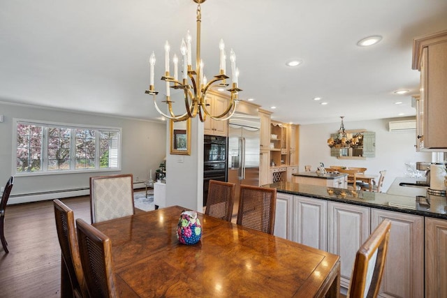 dining space featuring an inviting chandelier, crown molding, a baseboard heating unit, and recessed lighting