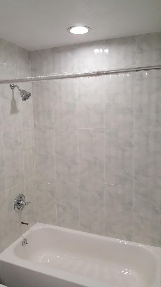 bathroom featuring  shower combination