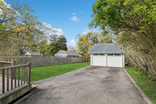 detached garage with fence