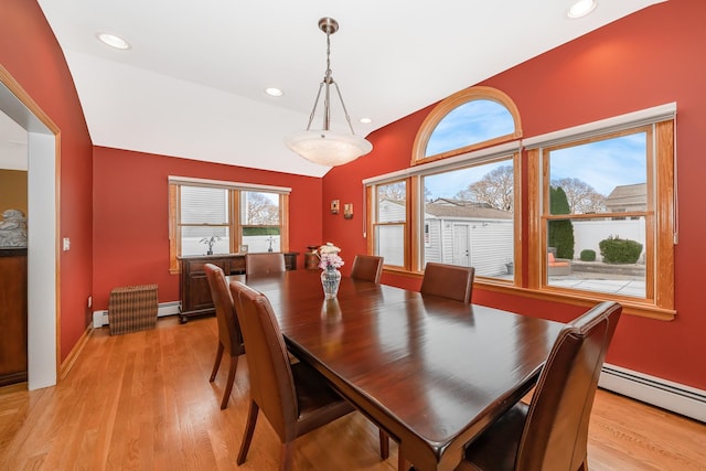 dining room featuring recessed lighting, light wood-style flooring, and baseboard heating