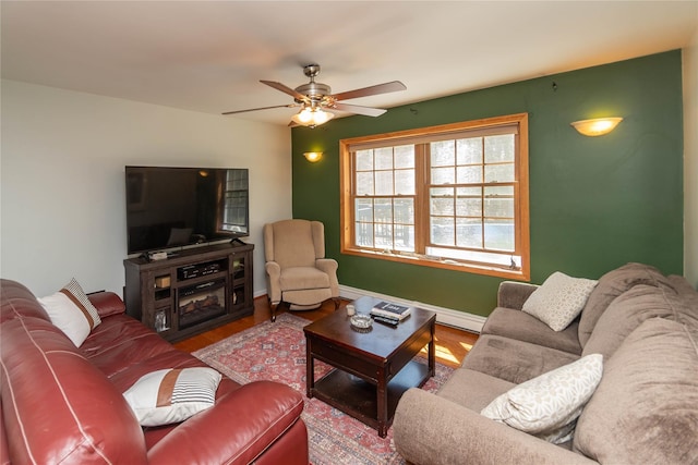 252 Southwoods Dr, Monticello, NY 12701 - living room with baseboards, ceiling fan, and wood finished floors