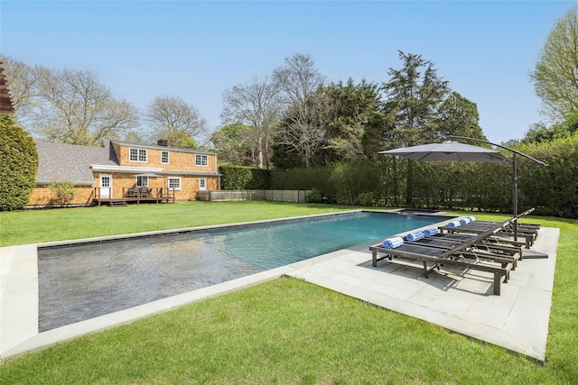 96 Audubon Ave, Bridgehampton, NY 11932 - outdoor pool with a yard, a patio area, a wooden deck, and fence