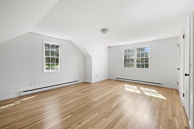 96 Audubon Ave, Bridgehampton, NY 11932 - bonus room with a healthy amount of sunlight, baseboard heating, a baseboard heating unit, and light wood-type flooring