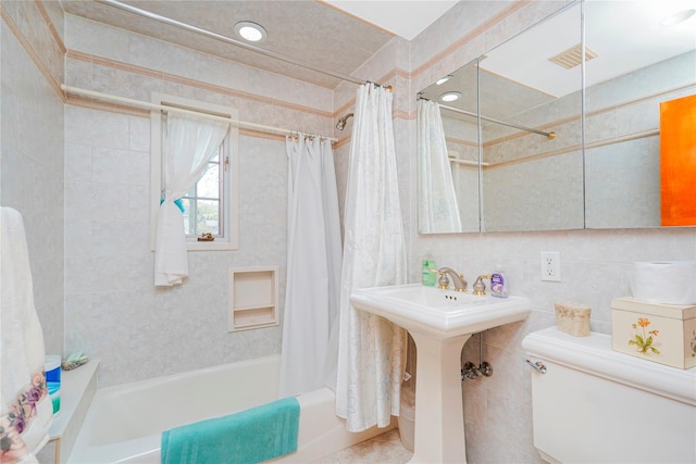 249Slosson Ave, Staten Island, NY 10314 - full bathroom with toilet, tile walls, visible vents, and shower / bath combination with curtain