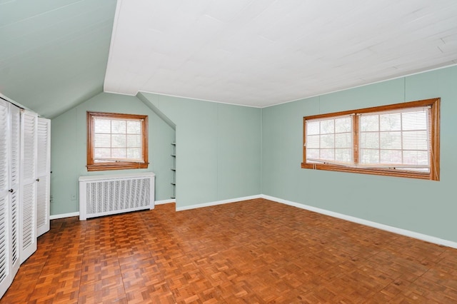 249Slosson Ave, Staten Island, NY 10314 - additional living space featuring baseboards, radiator, and vaulted ceiling