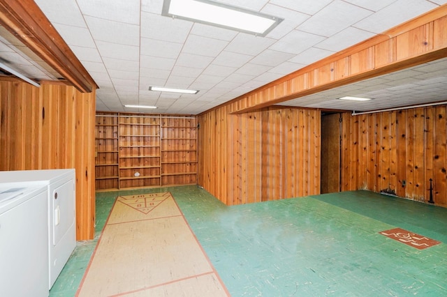 249Slosson Ave, Staten Island, NY 10314 - finished basement featuring washer and dryer, wood walls, and built in shelves