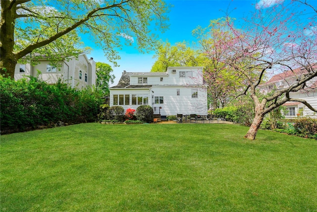 249Slosson Ave, Staten Island, NY 10314 - back of house with a lawn