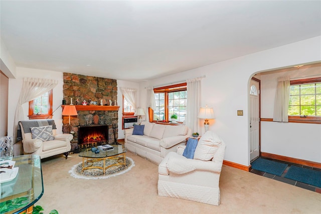 249Slosson Ave, Staten Island, NY 10314 - carpeted living area featuring a fireplace and baseboards
