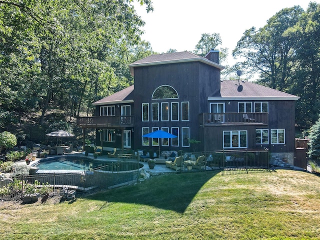 36 Ridgetop Dr, Tomkins Cove, NY 10986 - back of property with a balcony, a patio area, an outdoor hangout area, a chimney, and an outdoor pool