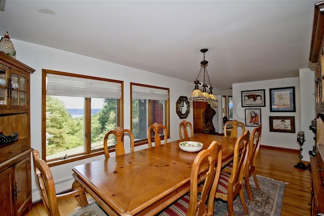 36 Ridgetop Dr, Tomkins Cove, NY 10986 - dining room with light wood-style floors, a baseboard heating unit, and baseboards