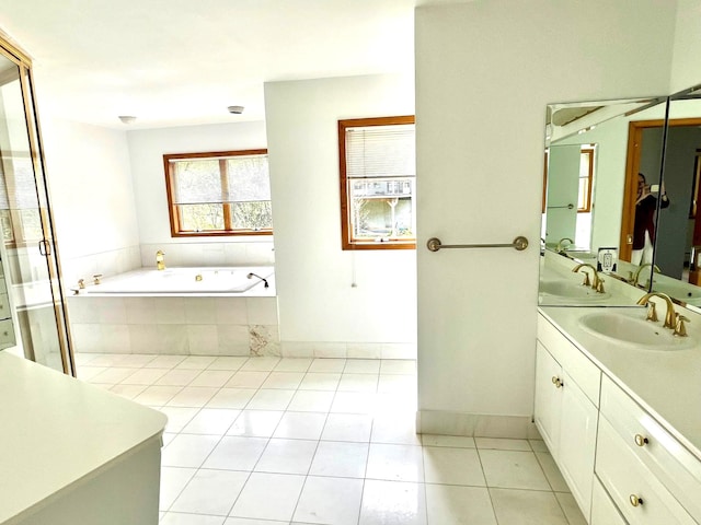 36 Ridgetop Dr, Tomkins Cove, NY 10986 - bathroom featuring tile patterned floors, a garden tub, double vanity, and a stall shower