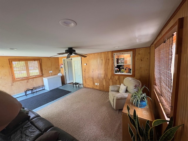 56 Martin Dr, Wappingers Falls, NY 12590 - carpeted living area with wood walls and ceiling fan
