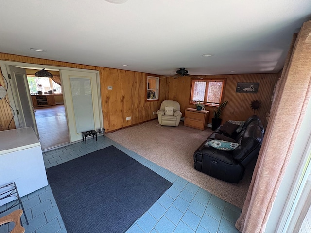 56 Martin Dr, Wappingers Falls, NY 12590 - living area with wooden walls, ceiling fan, tile patterned floors, and recessed lighting