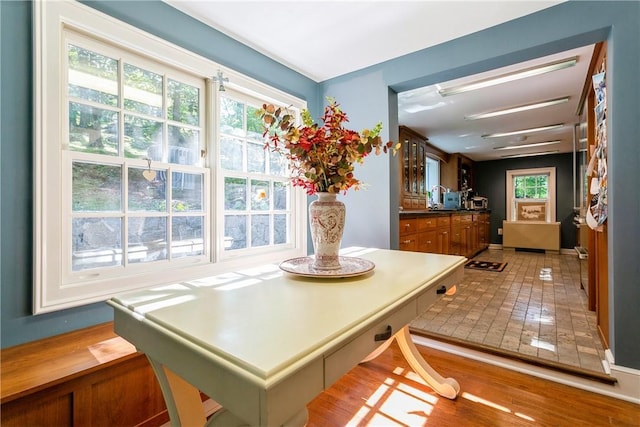 dining space with light wood-style floors