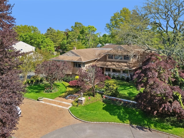 1325 Huckleberry Ln, Hewlett Harbor, NY 11557 - view of front of home with a front lawn