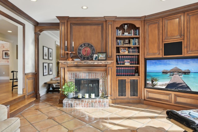 1325 Huckleberry Ln, Hewlett Harbor, NY 11557 - living room featuring ornamental molding, recessed lighting, a fireplace, light tile patterned floors, and built in shelves