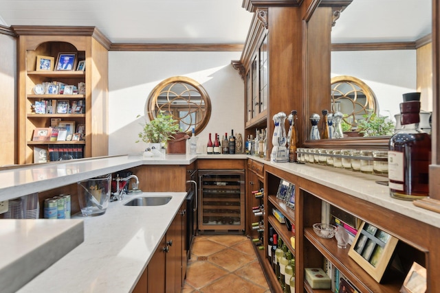 1325 Huckleberry Ln, Hewlett Harbor, NY 11557 - indoor wet bar featuring wine cooler, light tile patterned floors, and ornamental molding