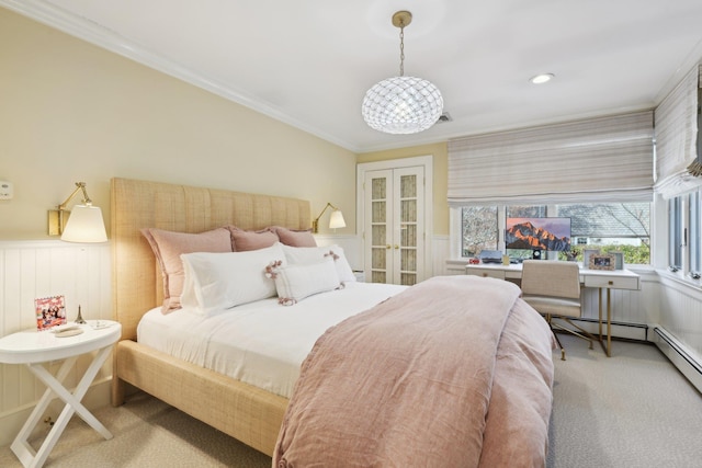 1325 Huckleberry Ln, Hewlett Harbor, NY 11557 - carpeted bedroom with wainscoting, crown molding, and french doors