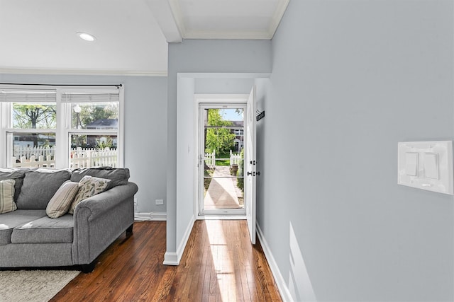 foyer entrance featuring dark wood-style flooring, baseboards, recessed lighting, and ornamental molding