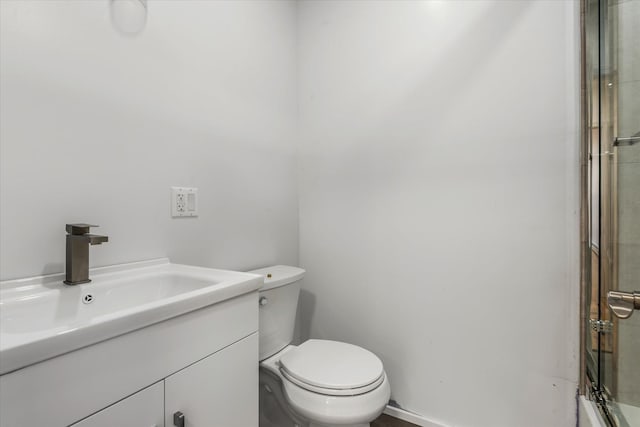 1236 Evergreen Ave, Bronx, NY 10472 - bathroom with toilet, vanity, and a shower with door